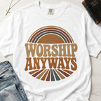 Worship Anyways Christian t-shirt in white, retro 70s sunburst design with bold worship typography in orange and brown.