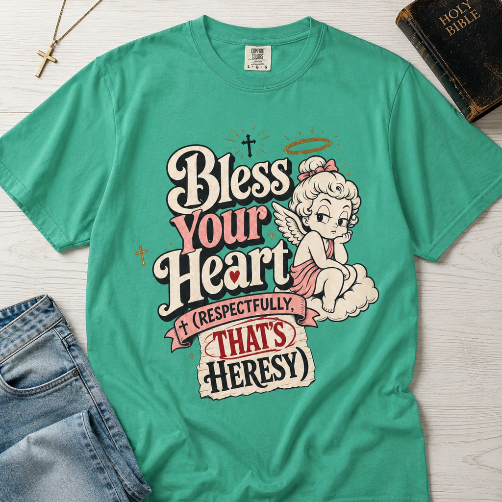 Bless Your Heart Christian humor t-shirt in mint Island Reef green, vintage angel cartoon graphic with 'respectfully that's heresy' detail.