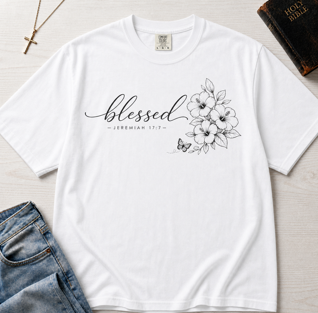 Blessed Floral Christian t-shirt in white, minimal 'blessed' cursive script with botanical floral sketch detail.