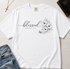 Blessed Floral Christian t-shirt in white, minimal 'blessed' cursive script with botanical floral sketch detail.