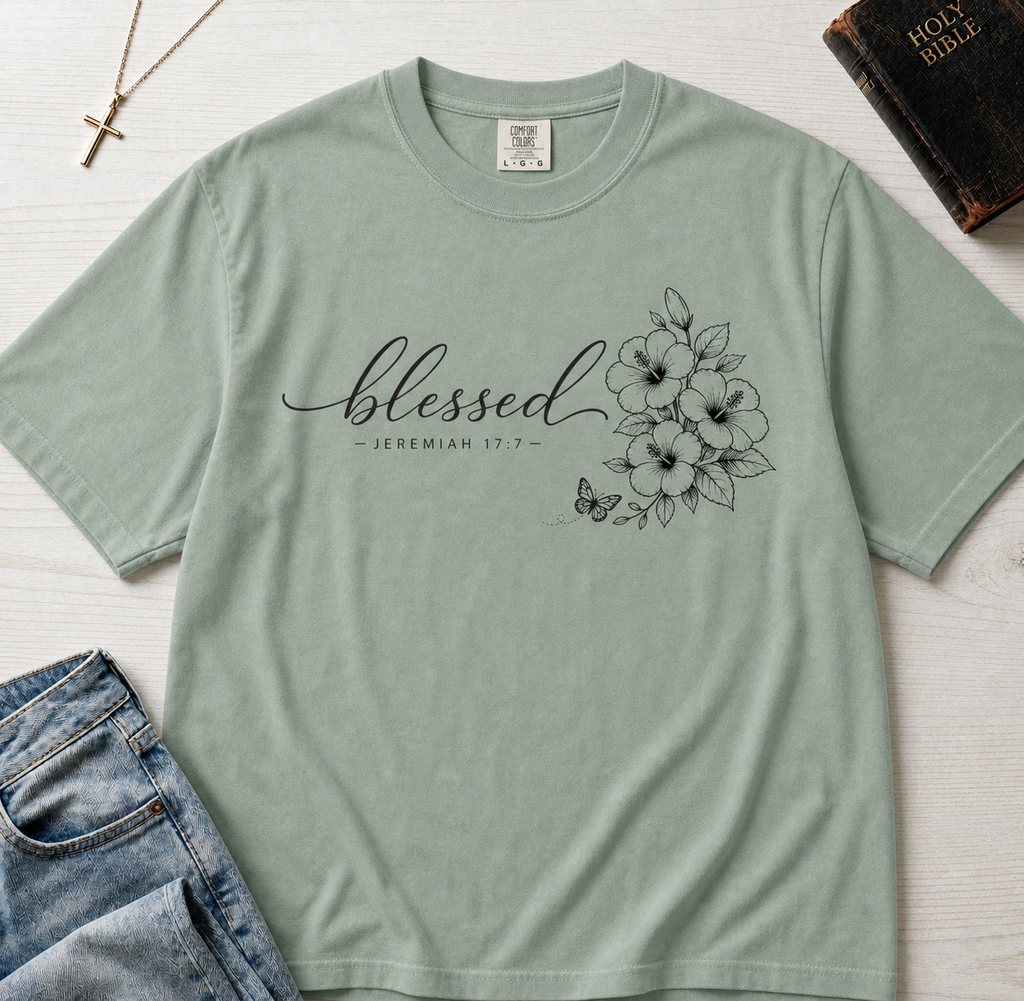 Blessed Floral Christian t-shirt in Bay sage green, minimalist 'blessed' cursive with delicate floral sketch design.