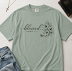 Blessed Floral Christian t-shirt in Bay sage green, minimalist 'blessed' cursive with delicate floral sketch design.