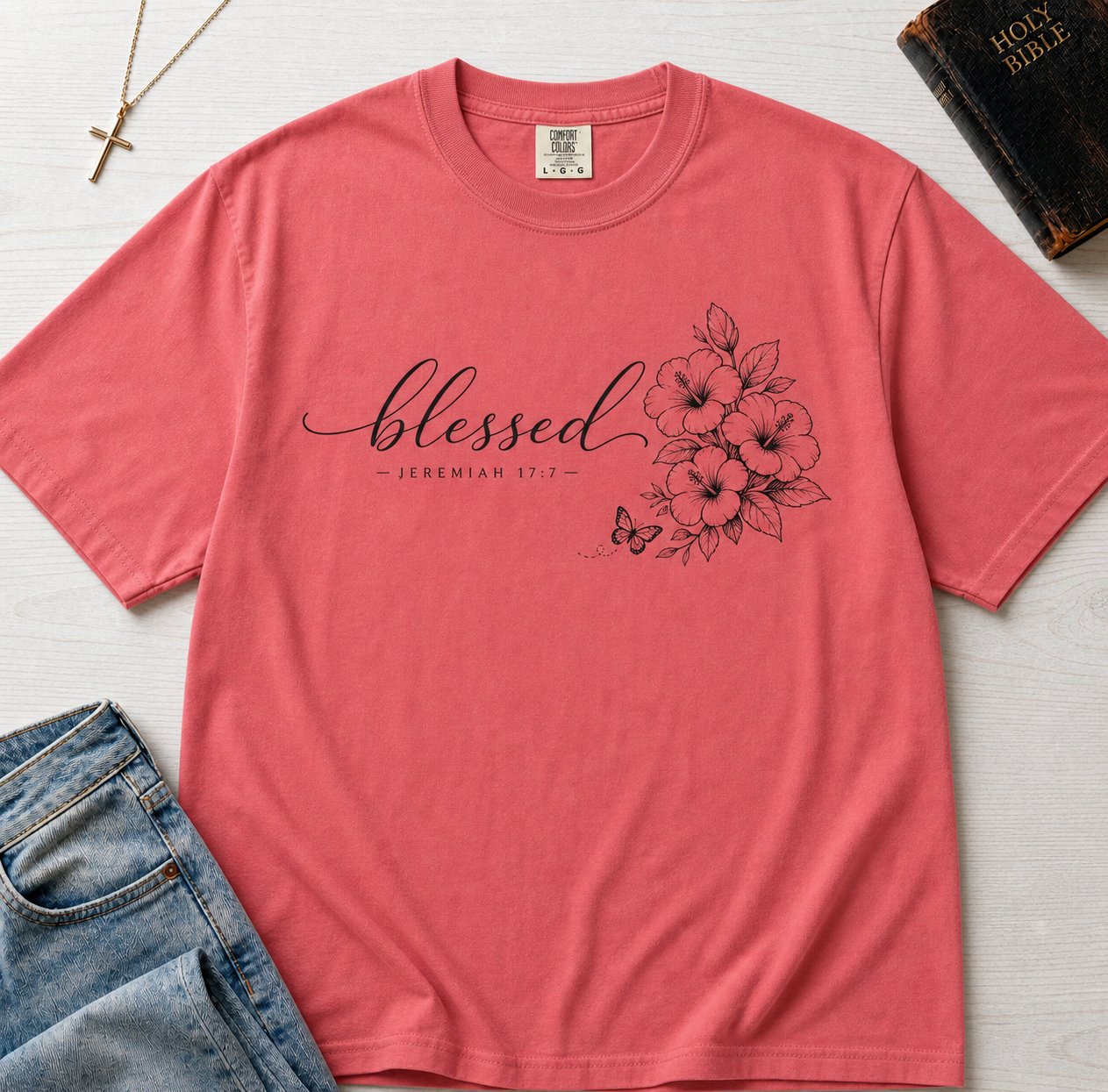Blessed Floral Christian t-shirt in dusty Crimson rose, 'blessed' cursive script with botanical floral sketch detail.