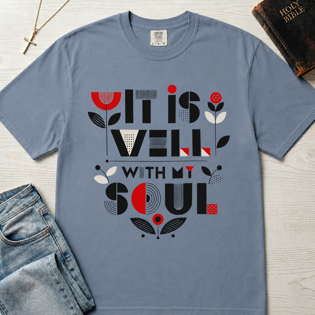 It Is Well With My Soul Christian t-shirt in dusty Blue Jean; bold mid-century typography with coral and gray tulip florals on garment-dyed tee.