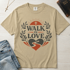 Walk in Love Christian t-shirt in khaki cream, garment-dyed faith-forward tee with sunburst cross, laurel wreath and winding path heart design.