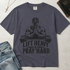 Lift Heavy Pray Hard Christian gym t-shirt in deep Graphite gray, faith and fitness graphic with muscular praying figure over barbell illustration.