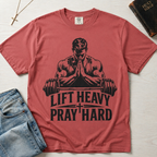 Lift Heavy Pray Hard Christian gym t-shirt in warm coral Watermelon, faith and fitness design with praying lifter and barbell on garment-dyed cotton.