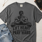 Lift Heavy Pray Hard Christian gym t-shirt in medium Granite gray, faith and fitness graphic with muscular praying figure over barbell illustration.