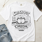 Crock-Pot Christian t-shirt in white, garment-dyed tee; retro graphic of a smiling slow cooker with 'faith' and 'grace' banners.