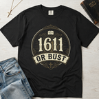 1611 Or Bust Christian t-shirt in graphite gray; vintage badge with large '1611' over an 'Or Bust' banner, ornate frame with open Bible and cross.