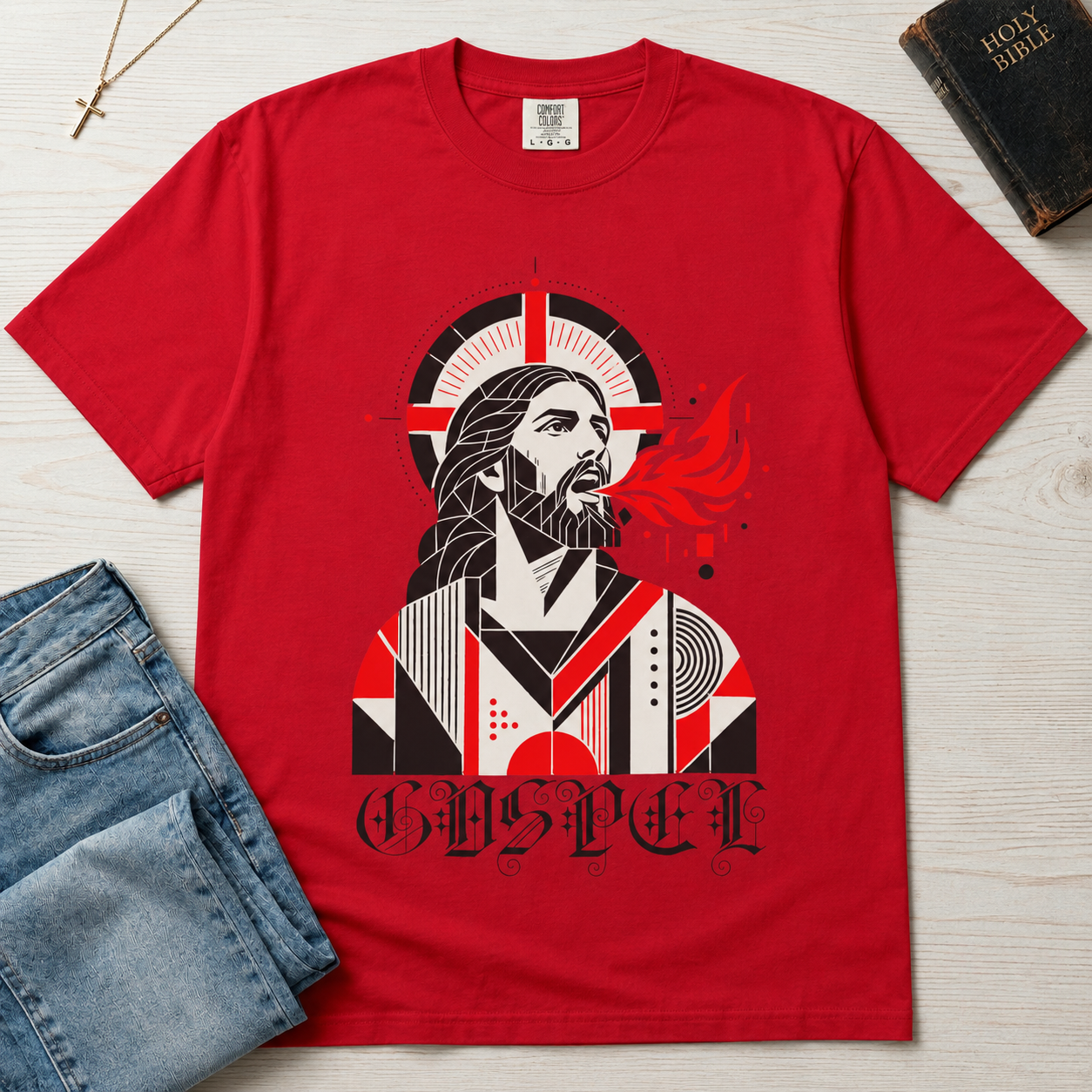 Gospel Christian t-shirt in red; geometric mid-century portrait of Jesus with a cross and red dove and gothic 'Gospel' lettering.