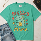 Blessed Mama Dinosaur t-shirt in mint green; cute cartoon green dino among flowers and hearts with 'Blessed Mama' lettering, faith mom tee.