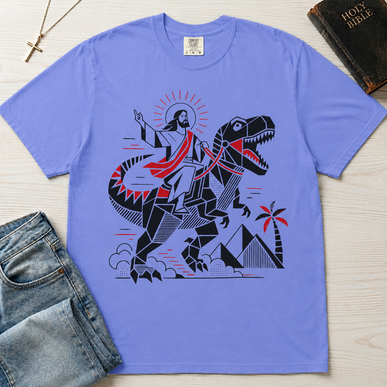 T-Shirt — 'Jesus Riding a Dinosaur' Graphic Tee (Retro Geometric Faith Design)