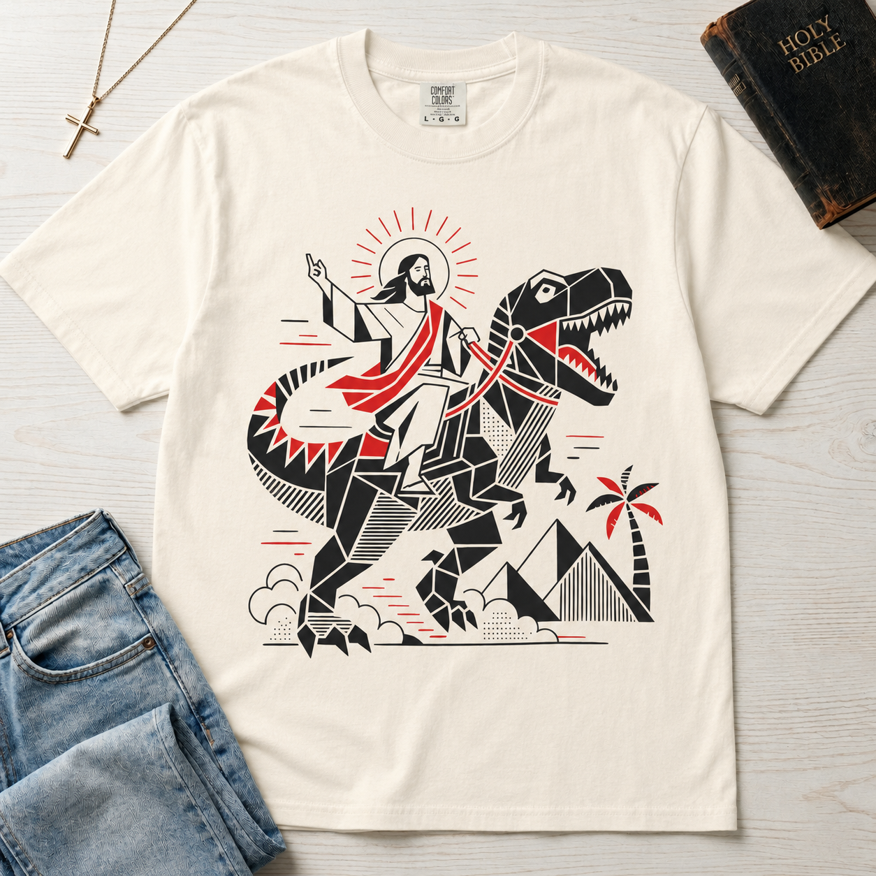 T-Shirt — 'Jesus Riding a Dinosaur' Graphic Tee (Retro Geometric Faith Design)